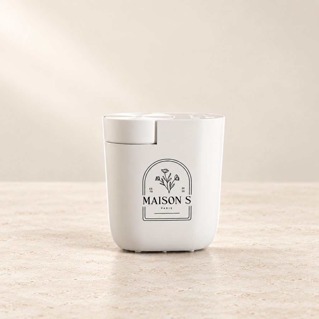 Mini Home Fragrance Diffuser Plug-In on a warm ivory luxury background